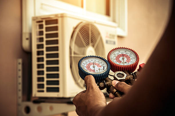 Professional Air Conditioning Service technician working in Taylors, SC
